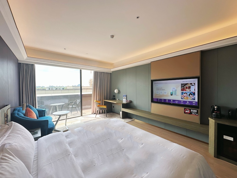 Habitación Privilege con 1 cama king size del hotel Mercure Shanghai Necc. Foto 3