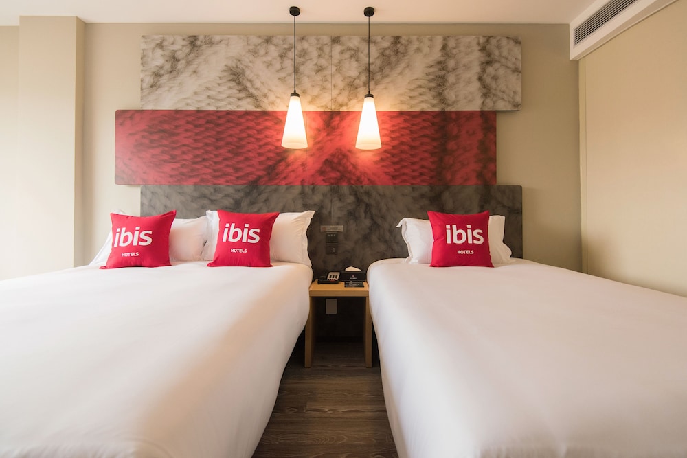 Habitación Familiar del hotel Ibis Xian Xingqing Palace Park. Foto 1