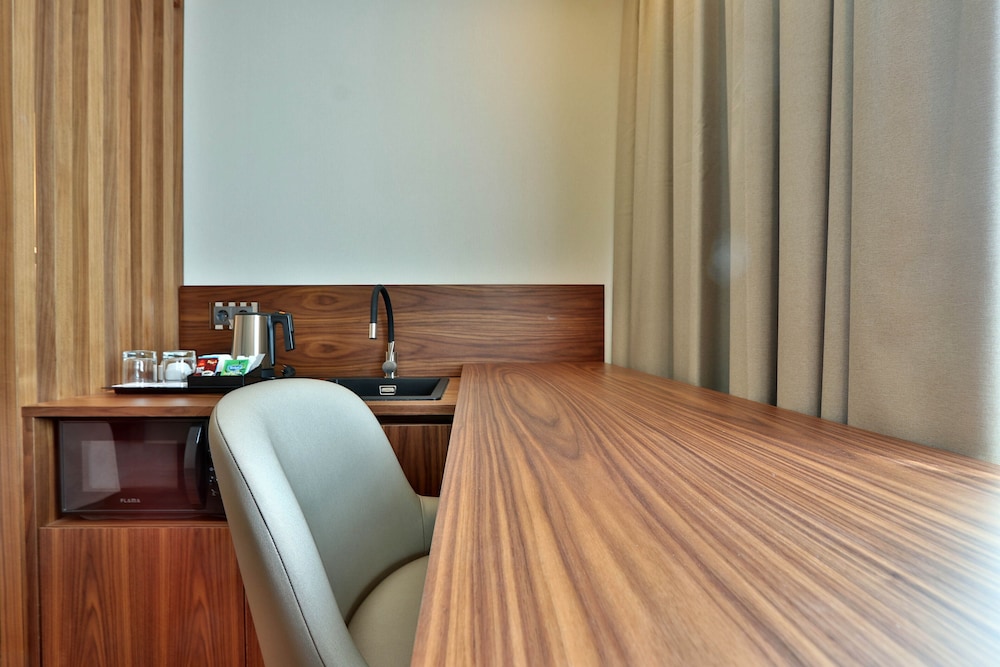 Habitación ejecutiva con 2 camas individuales del hotel Turim Ibéria. Foto 7