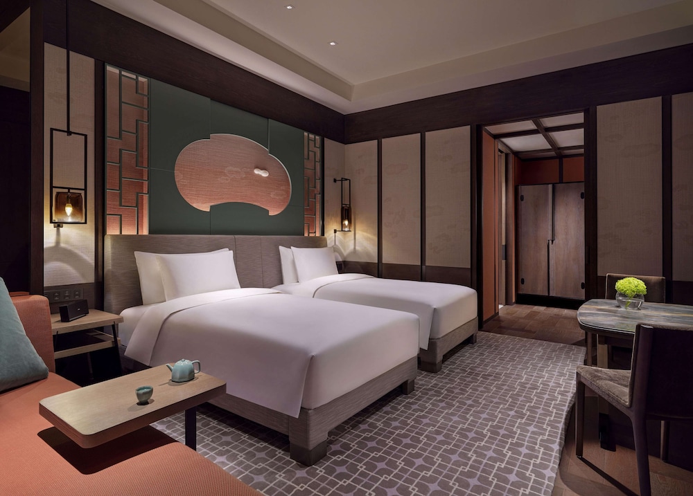 2 camas gemelas del hotel Park Hyatt Shenzhen