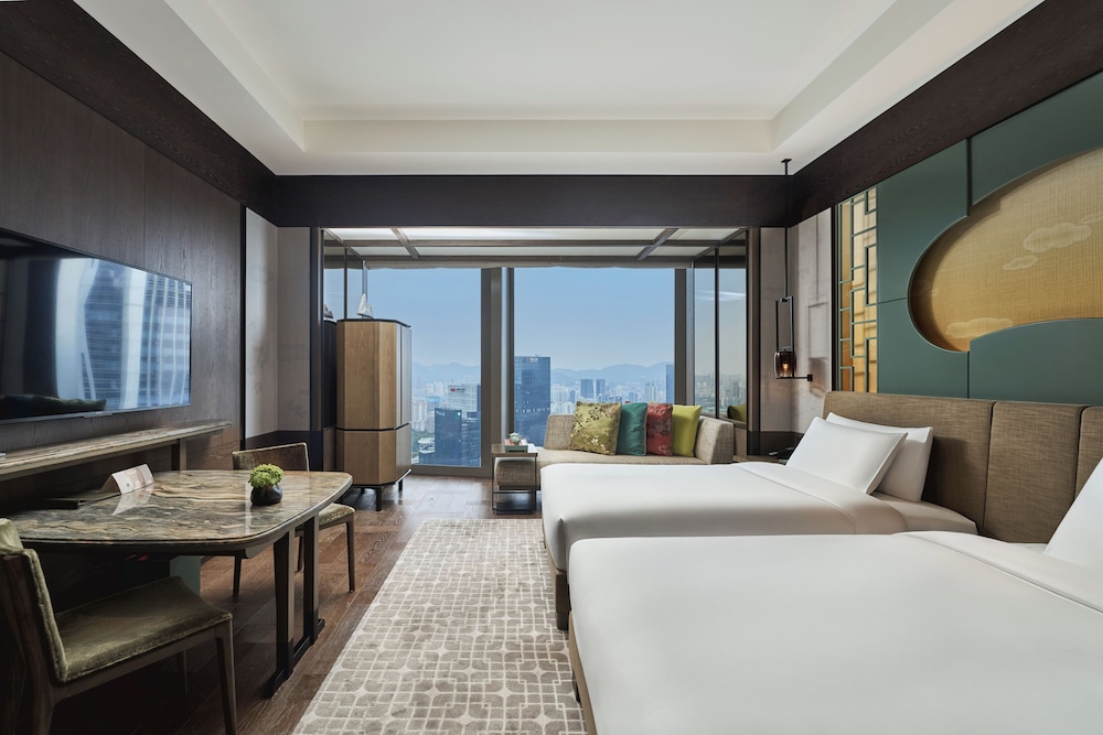 2 camas gemelas del hotel Park Hyatt Shenzhen. Foto 1