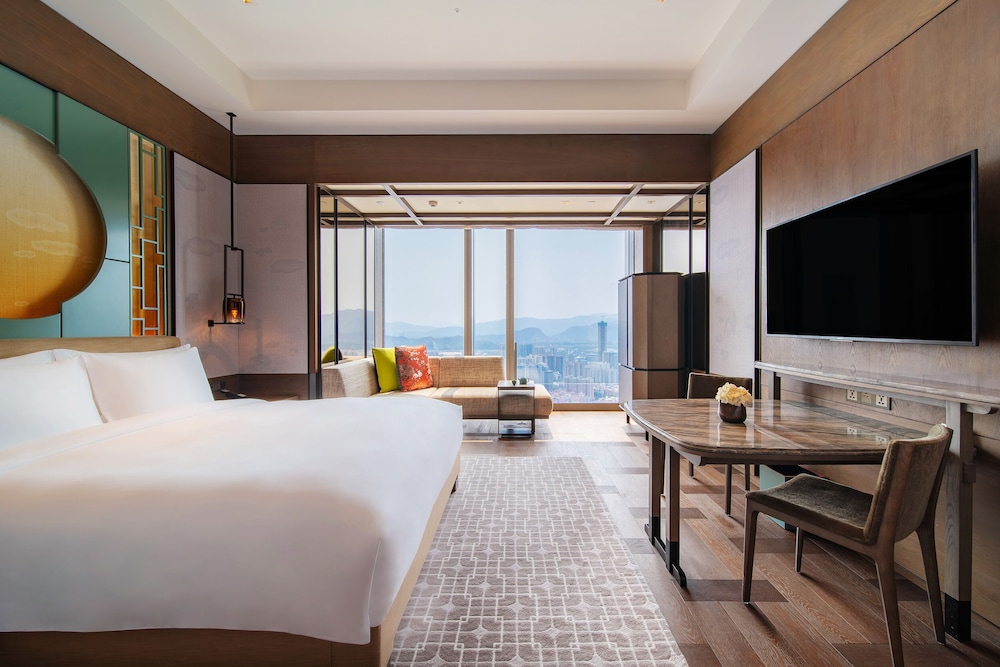 1 cama King, vistas a la ciudad del hotel Park Hyatt Shenzhen. Foto 1
