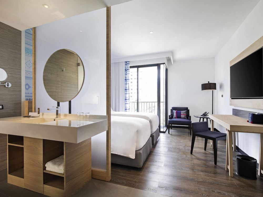 HABITACIÓN SUPERIOR CON DOS CAMAS INDIVIDUALES Y BALCÓN del hotel Novotel Chiangmai Nimman Journeyhub. Foto 4