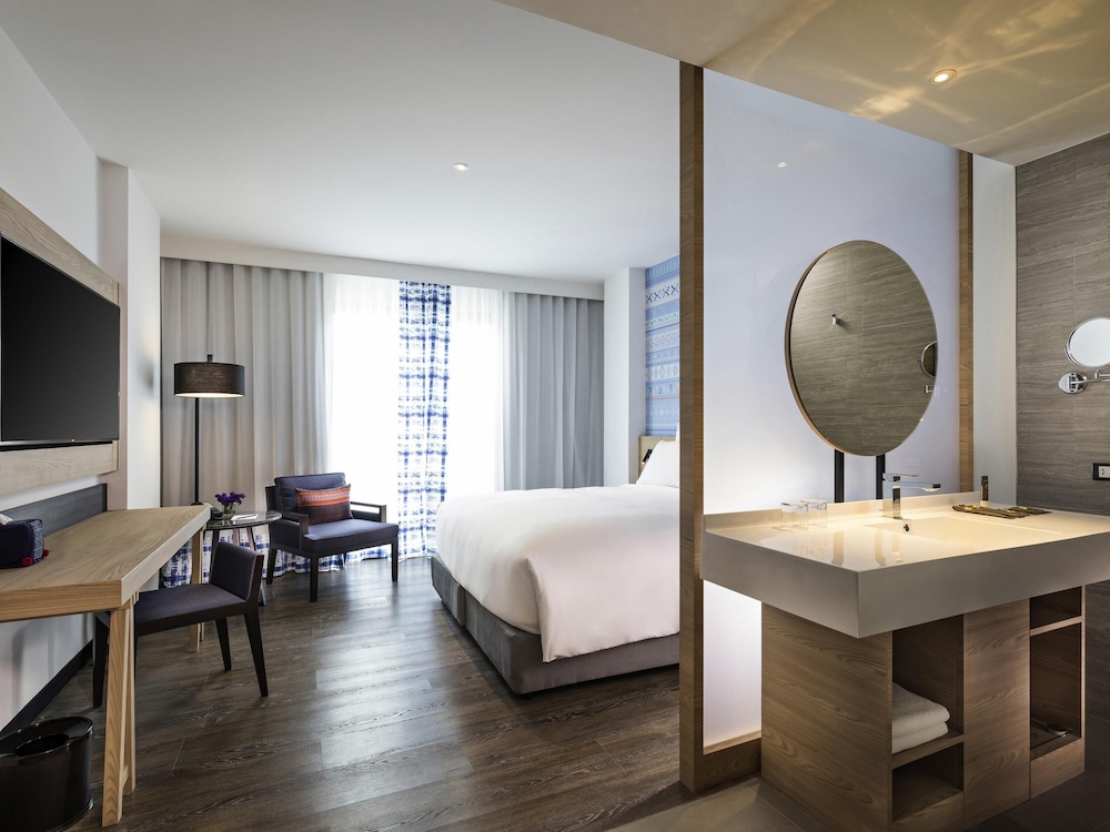 Habitación Deluxe con cama King del hotel Novotel Chiangmai Nimman Journeyhub. Foto 3