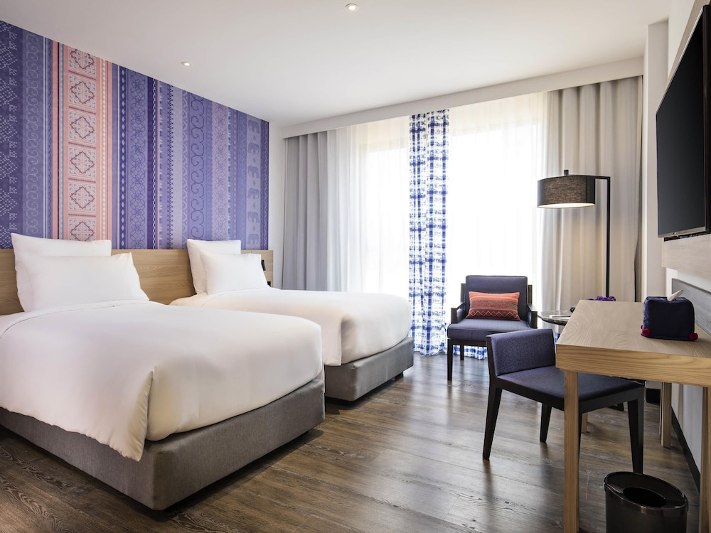 Habitación Deluxe con dos camas individuales del hotel Novotel Chiangmai Nimman Journeyhub