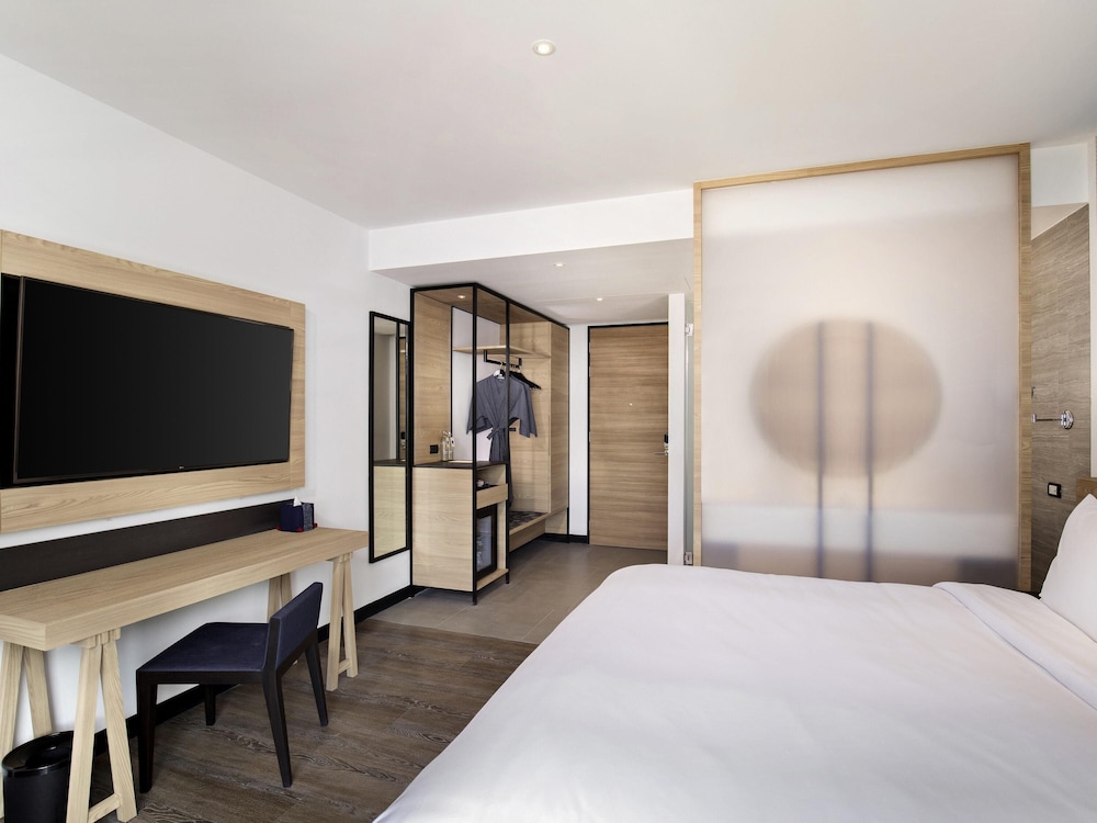 Habitación Deluxe con dos camas individuales del hotel Novotel Chiangmai Nimman Journeyhub. Foto 3