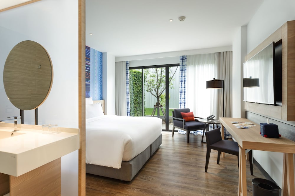 Habitación Deluxe con Cama King y Terraza (Apta para Mascotas) del hotel Novotel Chiangmai Nimman Journeyhub