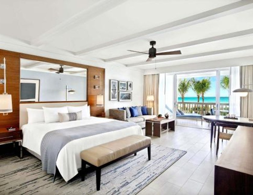Villa con cama extragrande, balcón y vistas al océano del hotel Fairmont El San Juan