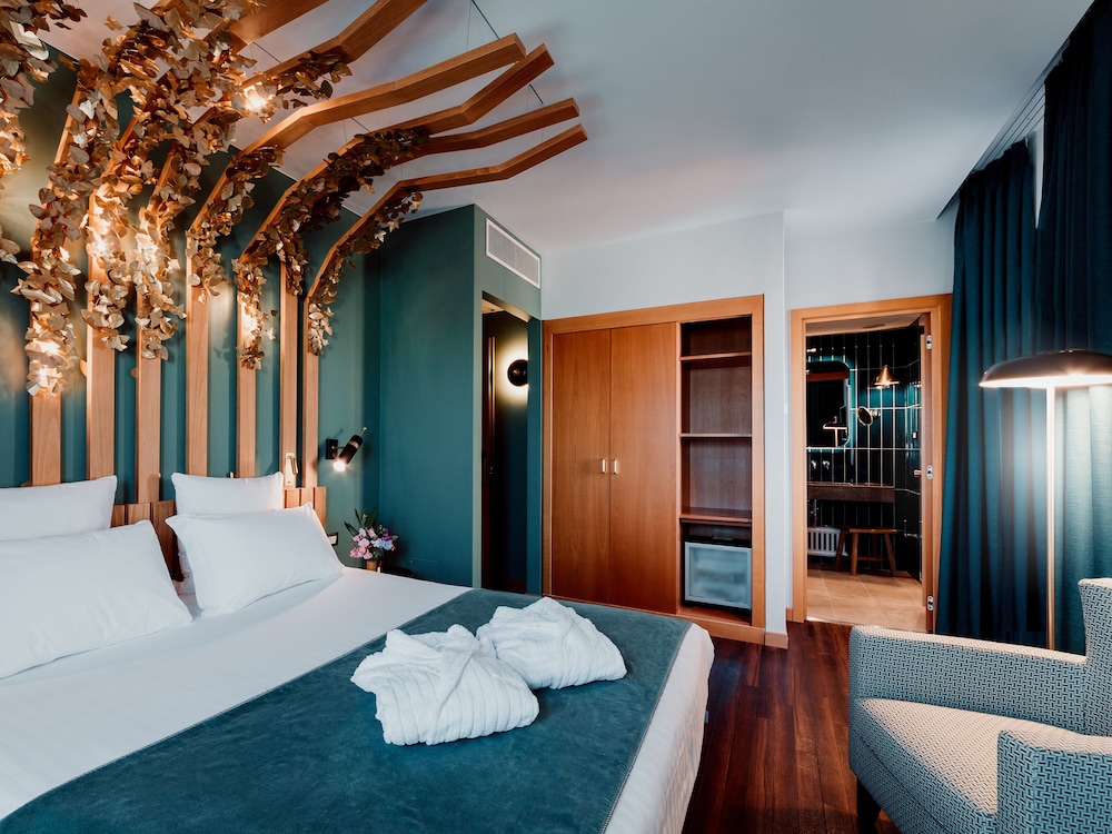 Habitación Deluxe doble con balcón del hotel Mercure Roma Corso Trieste. Foto 7