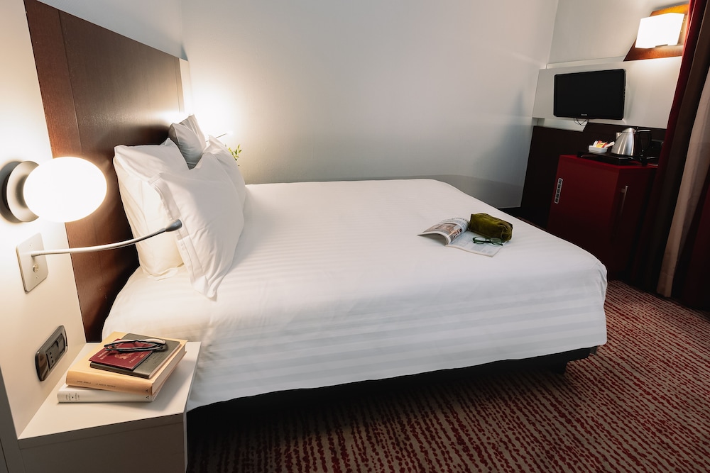 Habitación Doble Clásica del hotel Mercure Roma Piazza Bologna. Foto 2