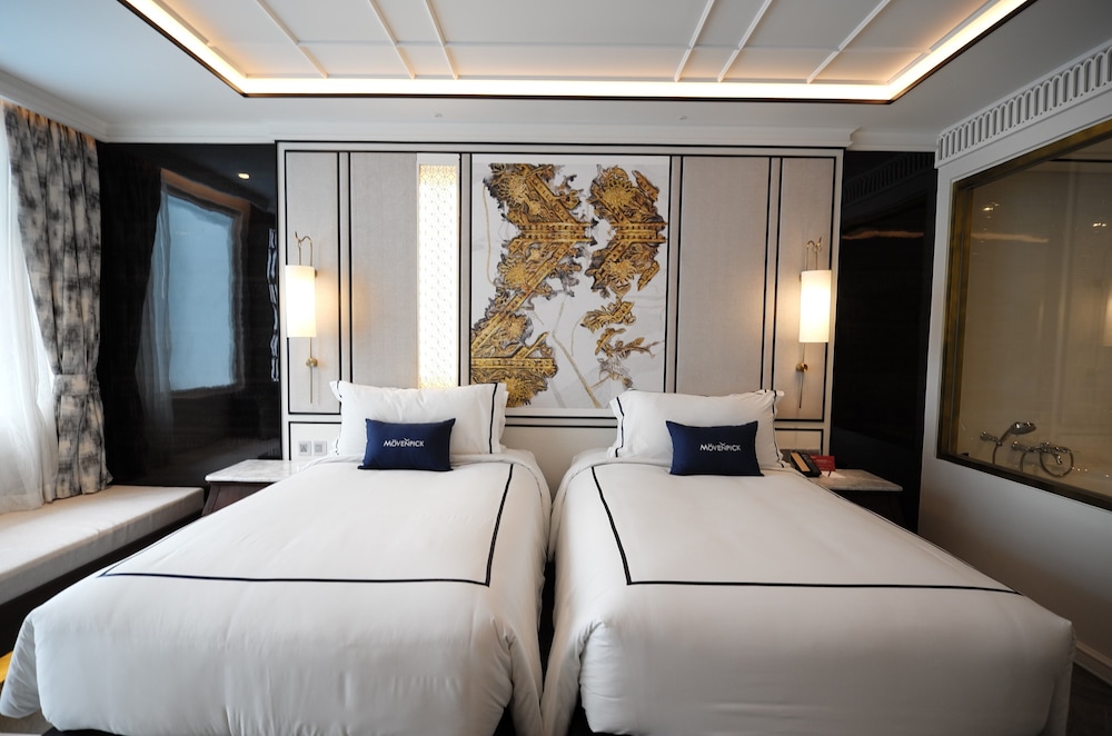 Habitación Deluxe, 2 camas individuales, vistas a la piscina del hotel Mövenpick Myth Hotel Patong Phuket. Foto 3
