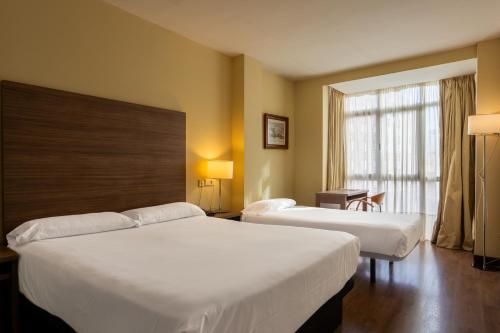 Habitación Triple del hotel Centro Los Braseros