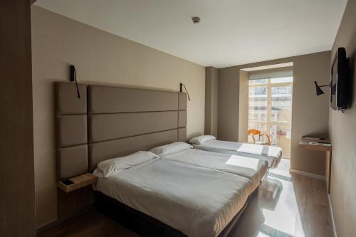 Habitación Triple del hotel Centro Los Braseros. Foto 3