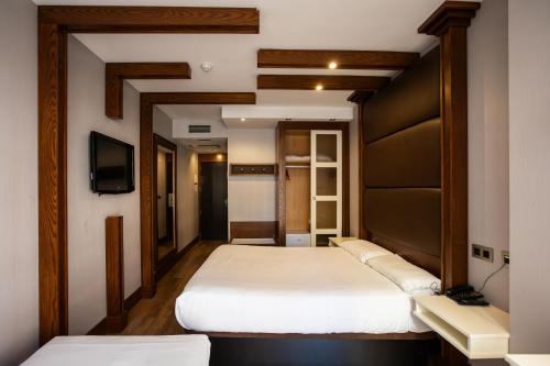 Habitación Triple del hotel Centro Los Braseros. Foto 4