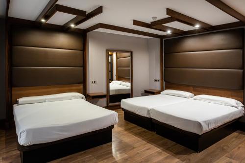 Habitación Cuádruple del hotel Centro Los Braseros. Foto 6