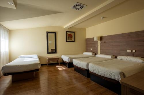 Habitación Cuádruple del hotel Centro Los Braseros. Foto 7