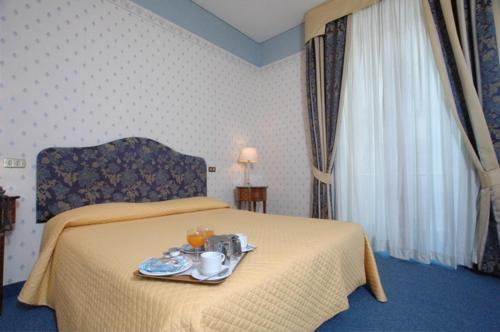 Habitación Triple del hotel Nuovo Rebecchino. Foto 9