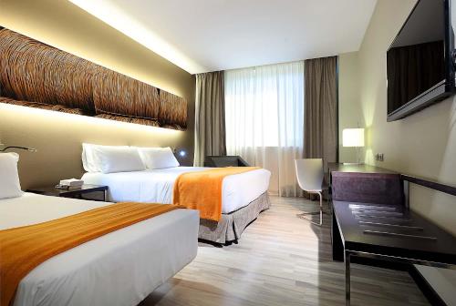 Habitación Triple del hotel Exe Puerto De Sagunto. Foto 3