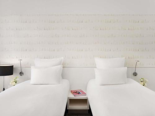 Habitación Classic accesible con dos camas individuales del hotel Nemzeti Budapest – Mgallery. Foto 1