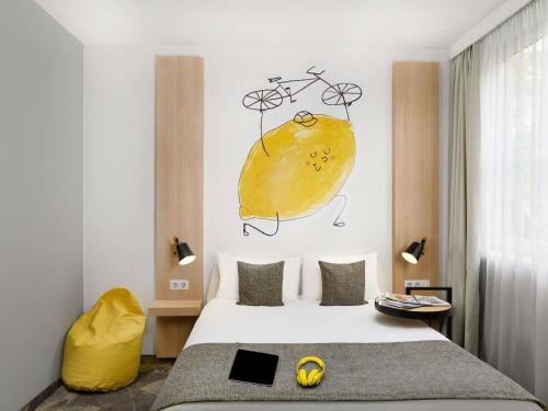 Habitación Familiar con 1 cama doble y 1 cama individual del hotel Ibis Styles Budapest City