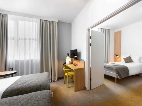Habitación Familiar con 1 cama doble y 1 cama individual del hotel Ibis Styles Budapest City. Foto 3