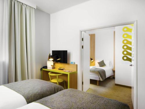 Habitación Familiar con 1 cama doble y 1 cama individual del hotel Ibis Styles Budapest City. Foto 8