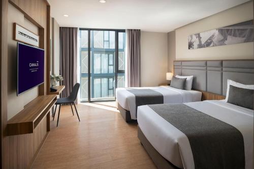 Alojamiento Deluxe con vistas a la piscina del hotel Canalis Suvarnabhumi Airport. Foto 1