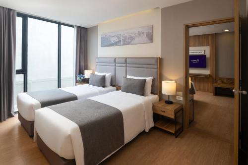 Habitación Familiar del hotel Canalis Suvarnabhumi Airport. Foto 13