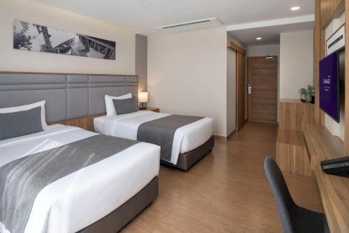 Habitación Doble Deluxe - 2 camas del hotel Canalis Suvarnabhumi Airport
