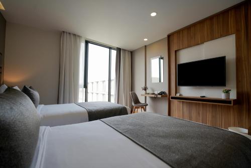 Habitación Doble Deluxe - 2 camas del hotel Canalis Suvarnabhumi Airport. Foto 10