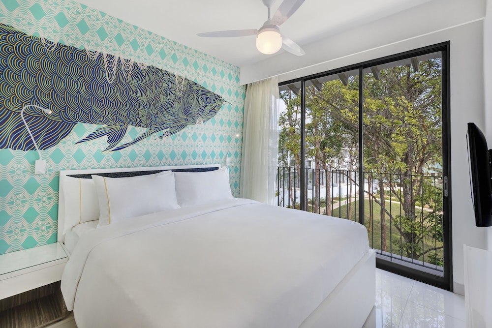 Suite Queen con Una Dormitorio del hotel Cassia Bintan. Foto 2