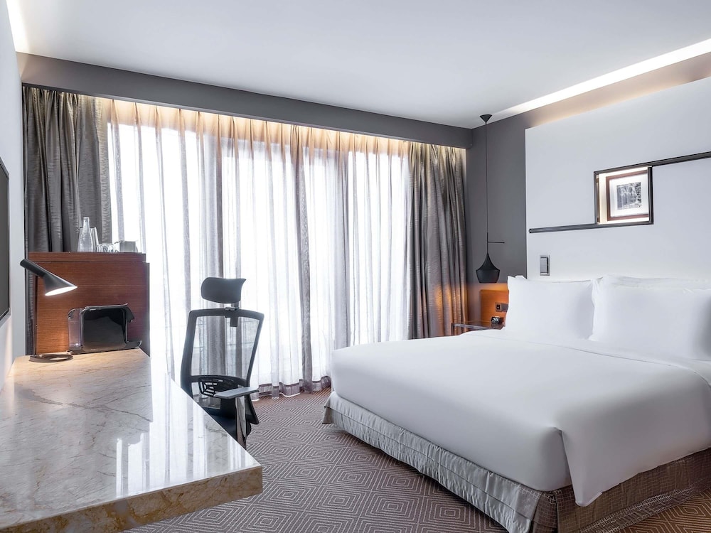 Habitación superior, 1 cama de matrimonio grande del hotel Movenpick and Convention Centre KLIA