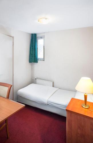 Habitación Individual del hotel Delta City Center. Foto 4