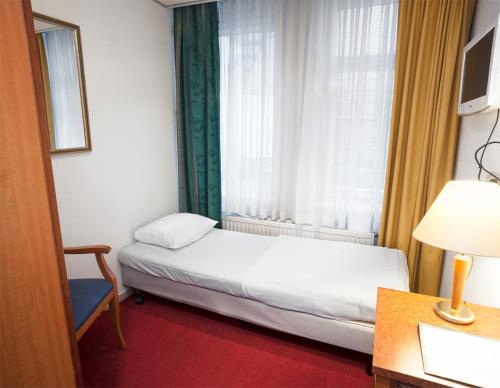 Habitación Individual del hotel Delta City Center. Foto 5