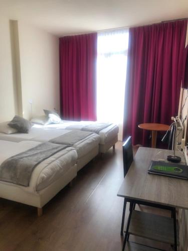 Habitación Triple del hotel Delta City Center. Foto 3