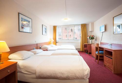 Habitación cuádruple del hotel Delta City Center. Foto 5