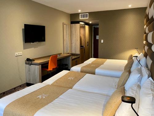 Habitación Cuádruple Estándar del hotel XO Hotels Blue Tower. Foto 1