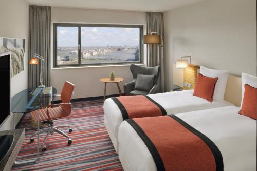 Habitación Doble Clásica - 2 camas del hotel Mövenpick Amsterdam City Centre. Foto 6