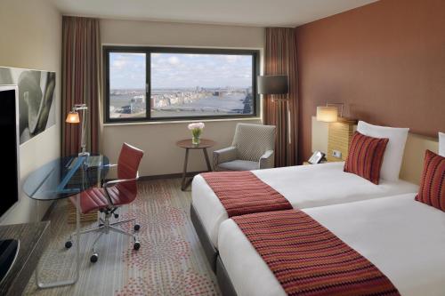 Habitación Executive - 2 camas del hotel Mövenpick Amsterdam City Centre. Foto 3