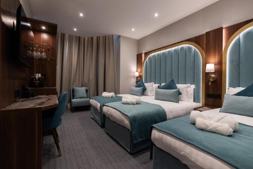 Habitación Triple Deluxe del hotel St Mark. Foto 12