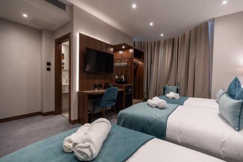 Habitación Triple Deluxe del hotel St Mark. Foto 14