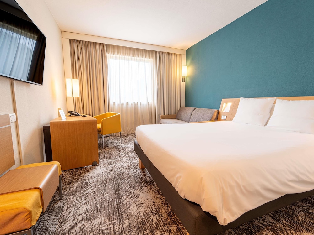 Habitación Superior con cama doble del hotel Novotel Roma Est. Foto 4