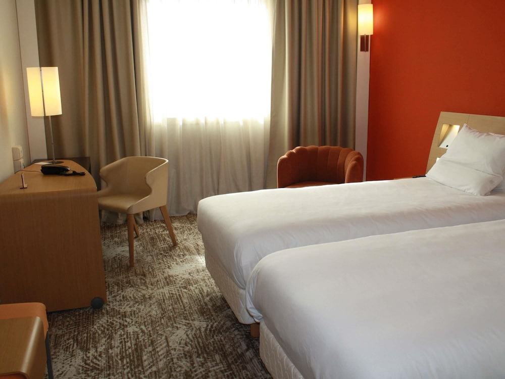 Habitación Superior con Dos Camas Individuales del hotel Novotel Roma Est. Foto 1