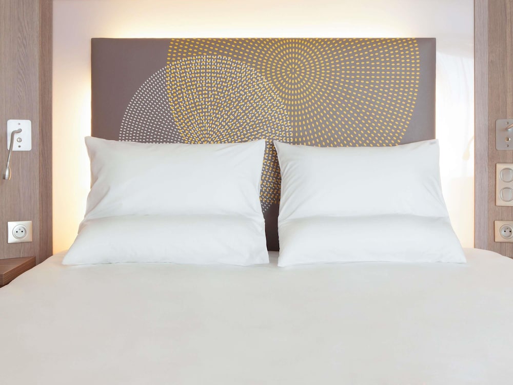 Habitación triple ejecutiva, 1 cama de matrimonio con sofá cama del hotel Novotel Paris Gare de Lyon. Foto 9