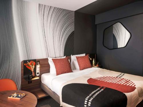 Habitación Triple Executive con sofá cama del hotel Novotel Paris Vaugirard Montparnasse. Foto 8
