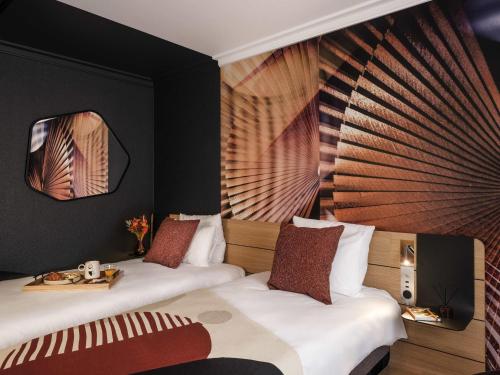 Habitación Twin Clásica del hotel Novotel Paris Vaugirard Montparnasse. Foto 6