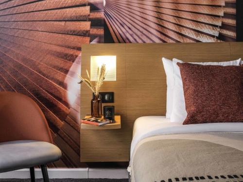 Habitación Doble Clásica con sofá cama individual del hotel Novotel Paris Vaugirard Montparnasse. Foto 6