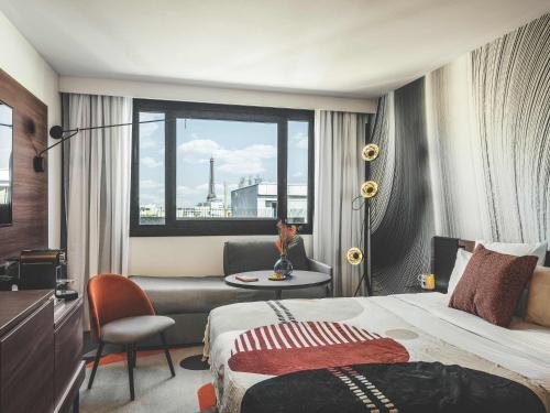 Habitación Executive con vistas a la Torre Eiffel - 1 cama doble y 1 sofá cama individual del hotel Novotel Paris Vaugirard Montparnasse. Foto 5