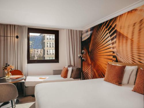 Habitación Doble Clásica con sofá cama individual del hotel Novotel Paris Vaugirard Montparnasse. Foto 6