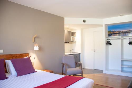 Suite Doble Superior del hotel Victoria Garden Bordeaux Centre. Foto 1